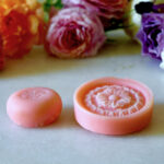 Small image of soaps surrounded by flowers for social media.
